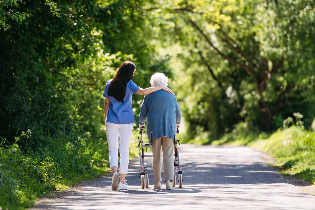 image of a women with a walker