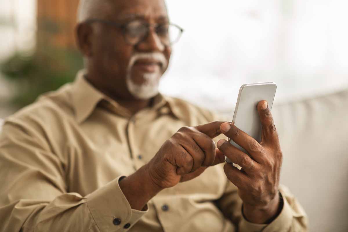 image of man who focused on a smartphone